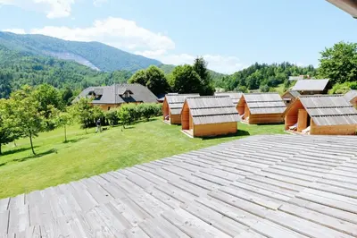 a view from the top of a building with houses at Small wooden houses and Apartments Zgornja Dobrava in Radovljica