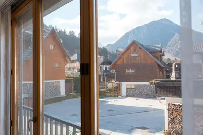 a view from a window of a village with buildings at Auredius Deluxe Apartment in Kranjska Gora