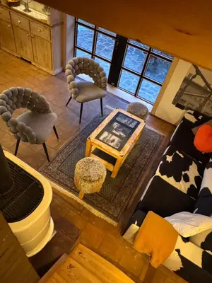 an overhead view of a living room with a couch and chairs at Alice Chalet Bled - Adults only in Bled