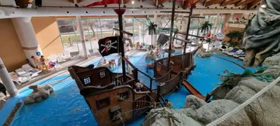 a water slide in a hotel with a pirate ship at Boho House 5 camp Terme Catez with promotional tickets prices in Čatež ob Savi