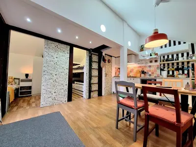 a kitchen and dining room with a table and chairs at Boho House 5 camp Terme Catez with promotional tickets prices in Čatež ob Savi