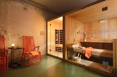 a room with a bunk bed and a table and a chair at Accommodation Vitalis in Ljubljana
