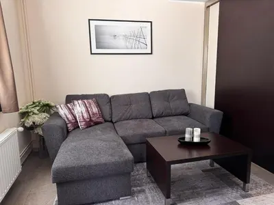 a living room with a couch and a coffee table at Apartma Anka *** in Kranjska Gora