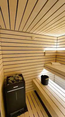 a inside of a sauna with a box in it at TEMPFER 2 Apartments & Rooms with new WELLNESS in Kranjska Gora