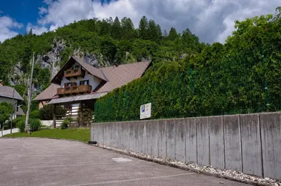 a house on top of a hill with a fence at Pr Bevc in Bled