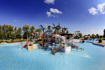 a water park with slides and rides in the water at Apartments Čatež - Terme Čatež in Čatež ob Savi