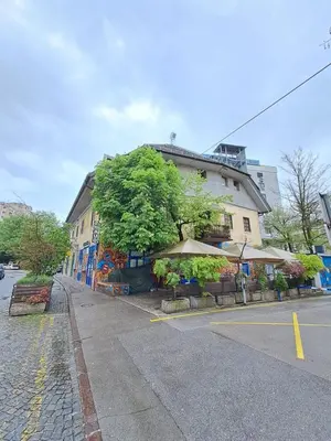 a building on the side of a street at Felix apartment Tour As Ljubljana in Ljubljana