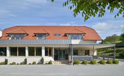 a house with a red roof at Guest House Vračko in Zgornja Kungota