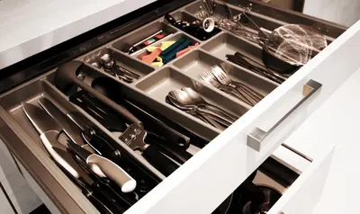 a drawer filled with utensils in a kitchen at CASA GLITTER in Ljubljana