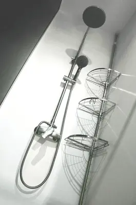three metal dishes hanging on a wall at CASA GLITTER in Ljubljana