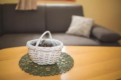 a basket sitting on top of a table at Apartma Smučka pod Roglo in Zreče