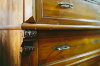 a close up of a wooden cabinet with wooden handles at B&B Pod Skalo in Kamnik