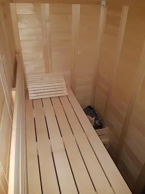 a wooden bed in a sauna at Holiday house Nune in Zreče