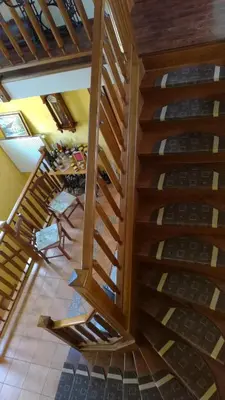 an overhead view of a room with wooden stairs at Merkež Guest House in Bizeljsko