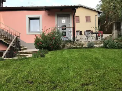 a house with a lawn in front of it at Vila Burbonka in Nova Gorica