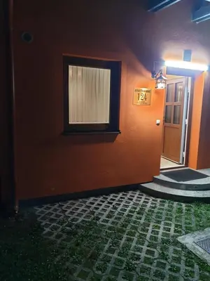a room with a door and a window and a tile floor at Terme Čatež Apartma Nine in Čatež ob Savi