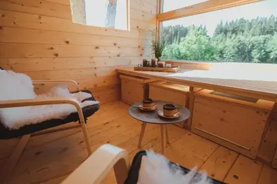 a room with a bed and a desk and a window at Tourist Farm Pr'Dovar in Cerklje na Gorenjskem