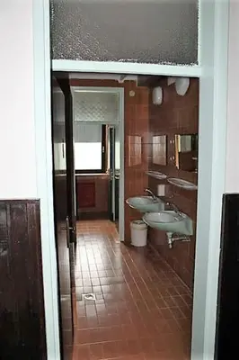 a bathroom with two sinks and two sinksktop at Youth Hostel Nika in Kranjska Gora
