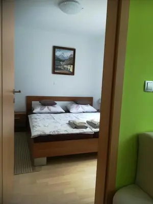 a bedroom with a bed in a room at Apartma Groš in Kranjska Gora
