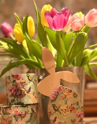 two vases filled with flowers sitting next to each other at Guesthouse Sabine - pr` Skminc in Bohinjska Bela