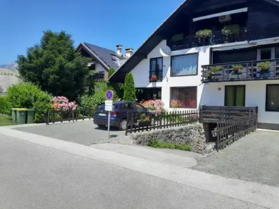 a car parked in front of a house at Aparthouse Ani in Radovljica