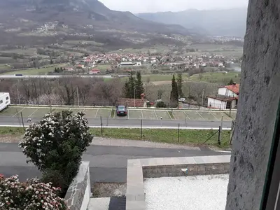 a view from a window of a city with a road at B & W KRIŽ in Ajdovščina