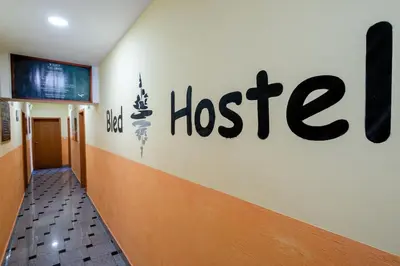 a hospital hallway with the word hospice on the wall at Bled Hostel in Bled