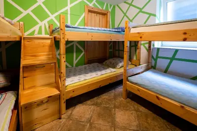 a bunk bed room with two bunk beds at Bled Hostel in Bled