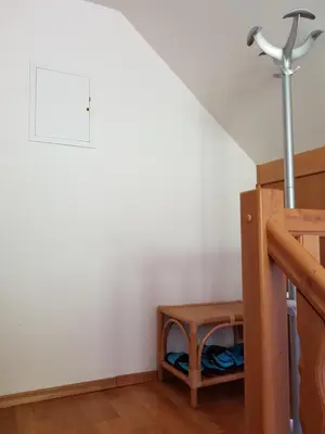 a room with a bunk bed and a lamp at Vaznik Farm House Apartments in Bled