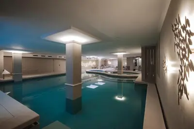 a large swimming pool in a large room with at Hotel Slatina Superior in Rogaška Slatina