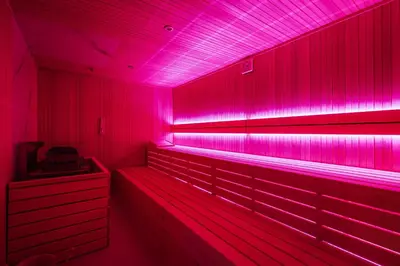 a red lighted room with pink lights in it at Hotel Slatina Superior in Rogaška Slatina