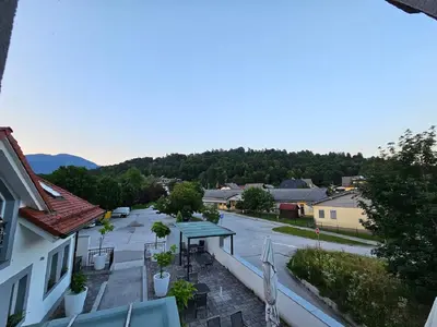 a view of a parking lot with a picnic table at Houston Resort in Radovljica