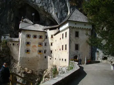 a building on the side of a mountain at Apartmaji Nena in Ročinj