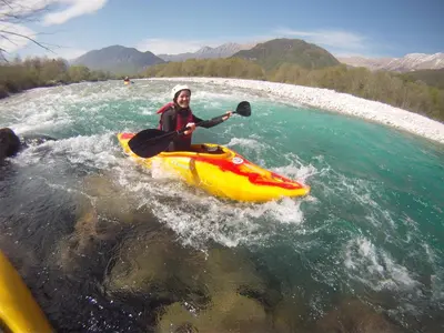 a person in a raft in the water at Hostel X Point in Kobarid