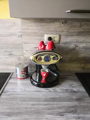 a table with two people on top of it at Bonito apartment in Postojna