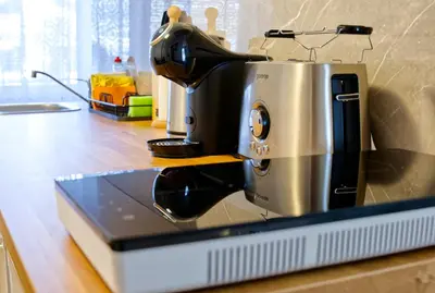 a coffee maker sitting on top of a counter at APARTMENT PETEK in Bled