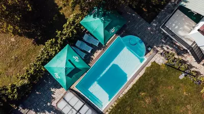 an overhead view of a building with blue roofs at Vila Anna in Radenci