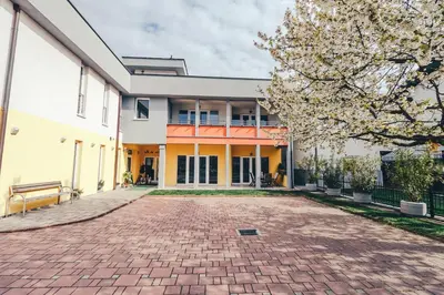 a brick driveway in front of a building at Vila Anna in Radenci
