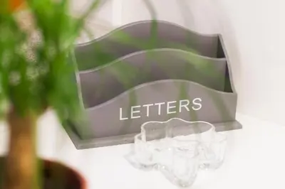 a sign that says lefters hanging on a wall at Studio Jan in Zgornje Gorje