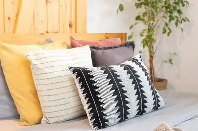 a pile of pillows sitting on a couch at Funky soul studio in Žirovnica