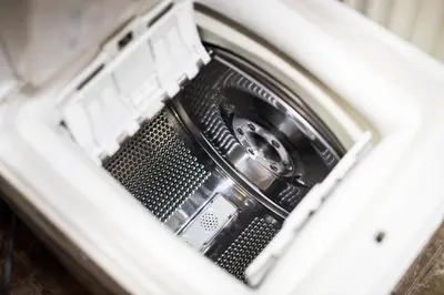 a washing machine is shown with its door open at Apartment Jacobs in Bled