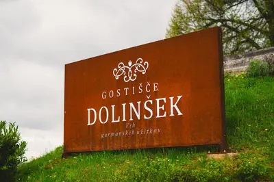 a sign for a dulwich at Guesthouse Dolinsek in Sevnica