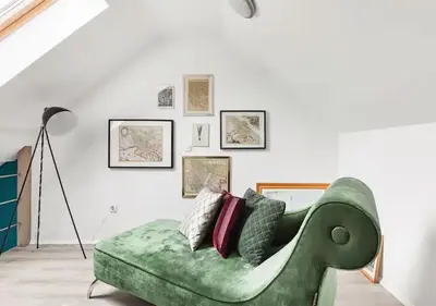 a green couch sitting in a living room at Blissful Loft Tivoli in Ljubljana