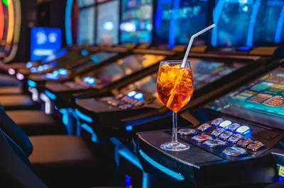 a drink in a glass in a slot machine at Casino & Hotel ADMIRAL Ptuj in Ptuj