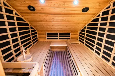 an inside view of a sauna with wooden floors at Luxury Apartment Ana with Hot tub in Višnja Gora