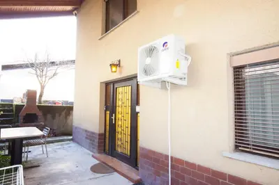 a air conditioner on the side of a building at Na Kopitarjevi in Laško
