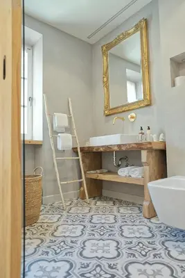 a bathroom with a sink and a mirror at Villa Majda in Osp