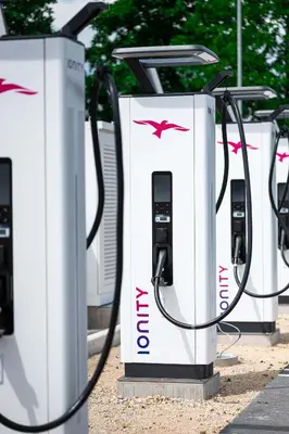 a row of gas pumps lined up in a row at Hotel A plus in Celje