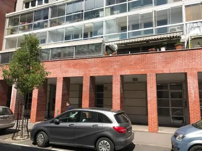 a silver car parked in front of a building at Viktor in Ljubljana