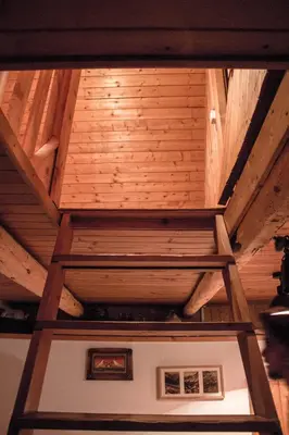 a ceiling in a room with wooden ceilings at Cottage Trenta in Bovec